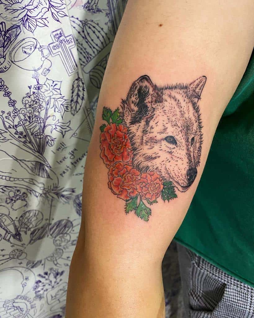 Small Wolf Upperarm Tattoo tattoosillustrate