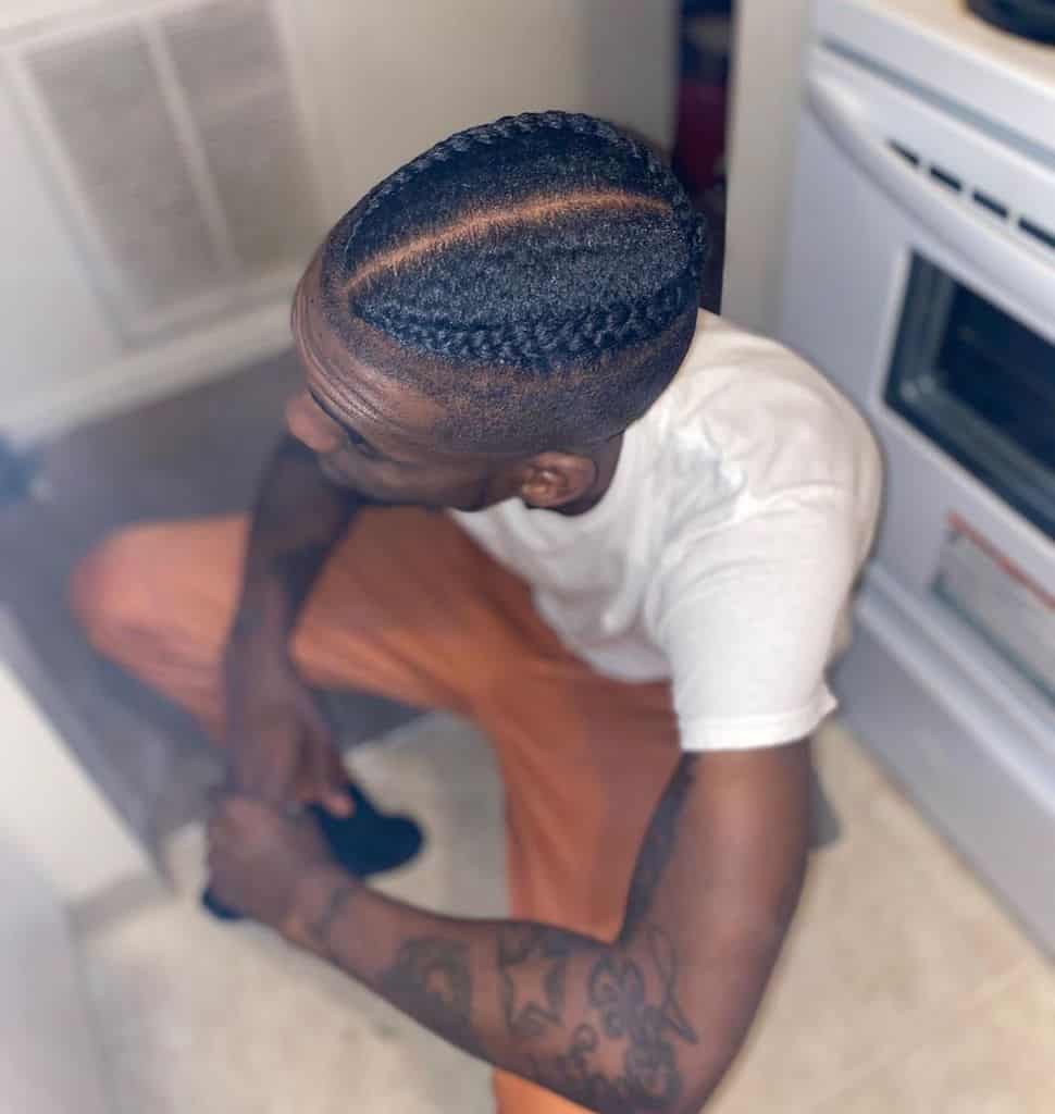 Small Duo Braids Paired With An Undercut And Un Braided Hair On One Side