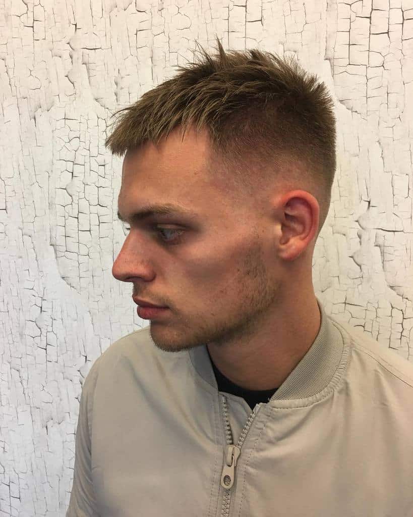 A modern variation of crew cut featuring spiked fringe and faded back and sides