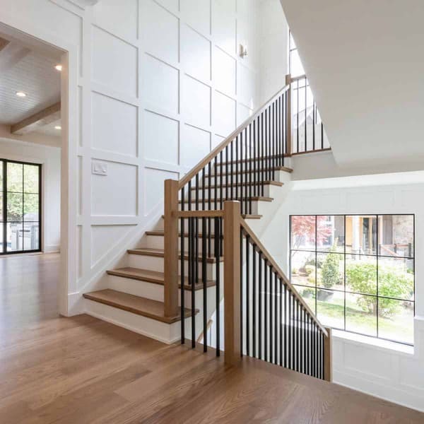 staircase with wainscoting