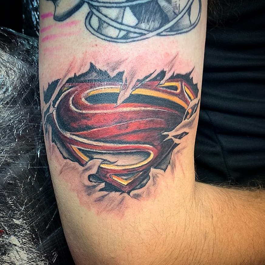 Ripped Skin Superman Tattoo -shel_tattoos