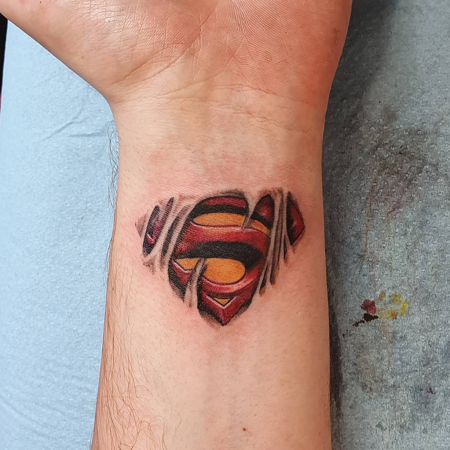 Superman Wrist Tattoo -magali_imagink_tattoo