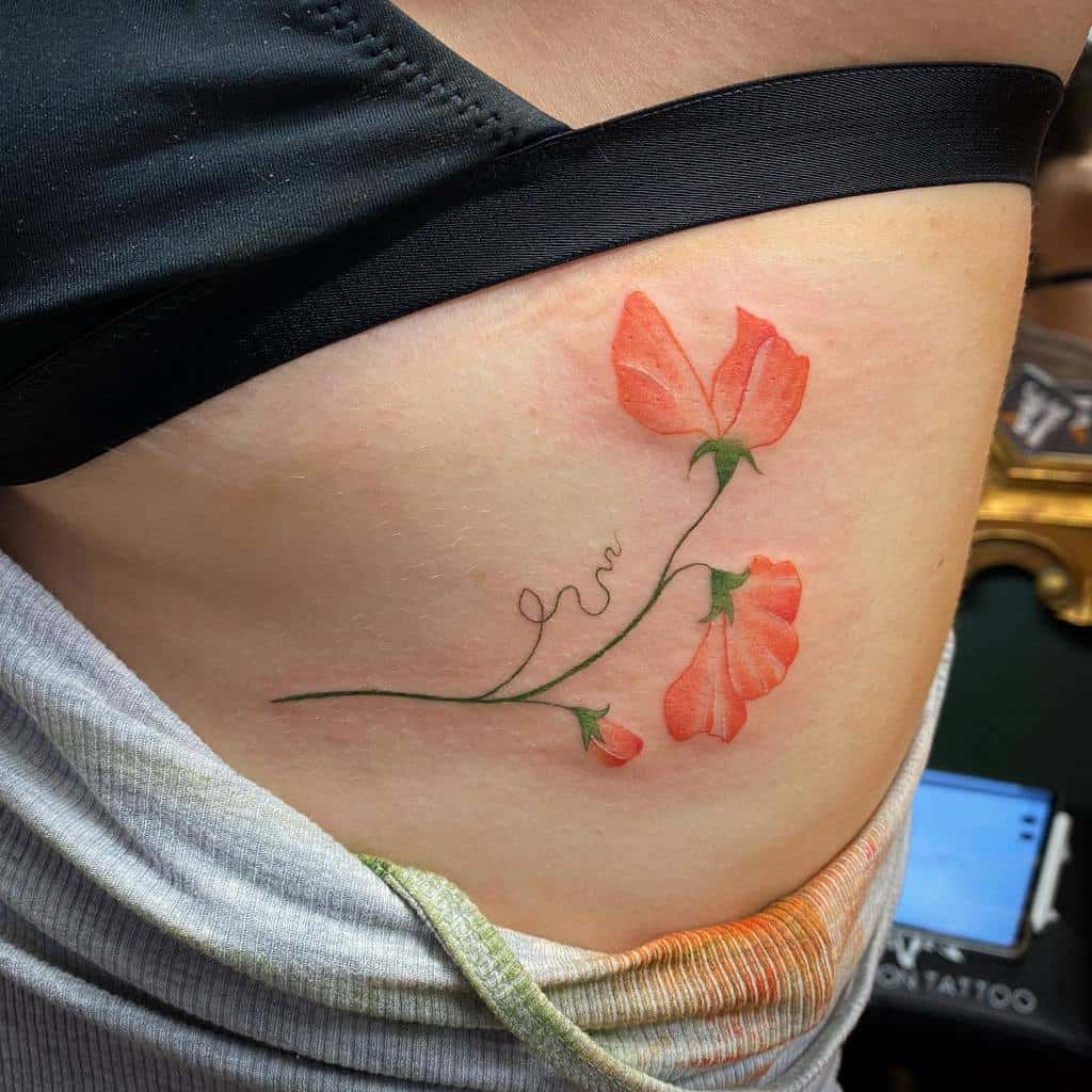 Sweet Pea Flower Rib Tattoo coralmoon.tattoo