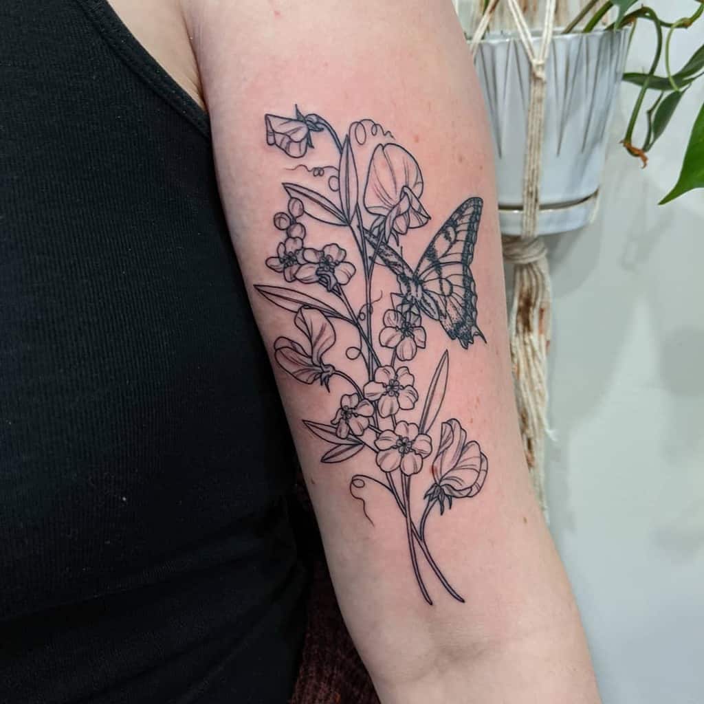 Sweet Pea Flower Upperarrm Tattoo mothandflametattoos