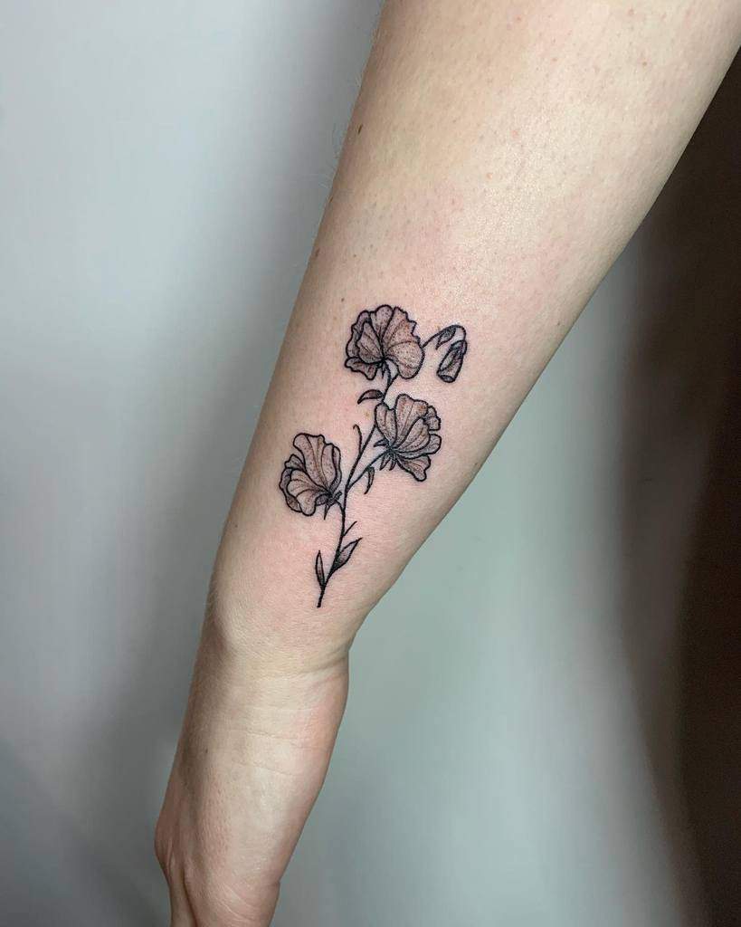 10. Sweet Pea Flower Tattoos for the Wrist.