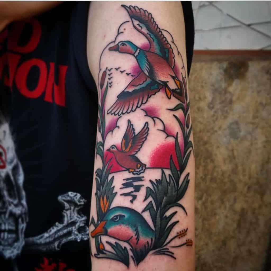 Traditional Upper Arm Tattoos redcloudtattoo