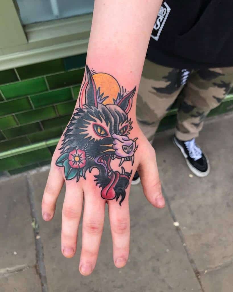 Traditional Wolf Hand Tattoo _lifes_not_out_to_get_you_