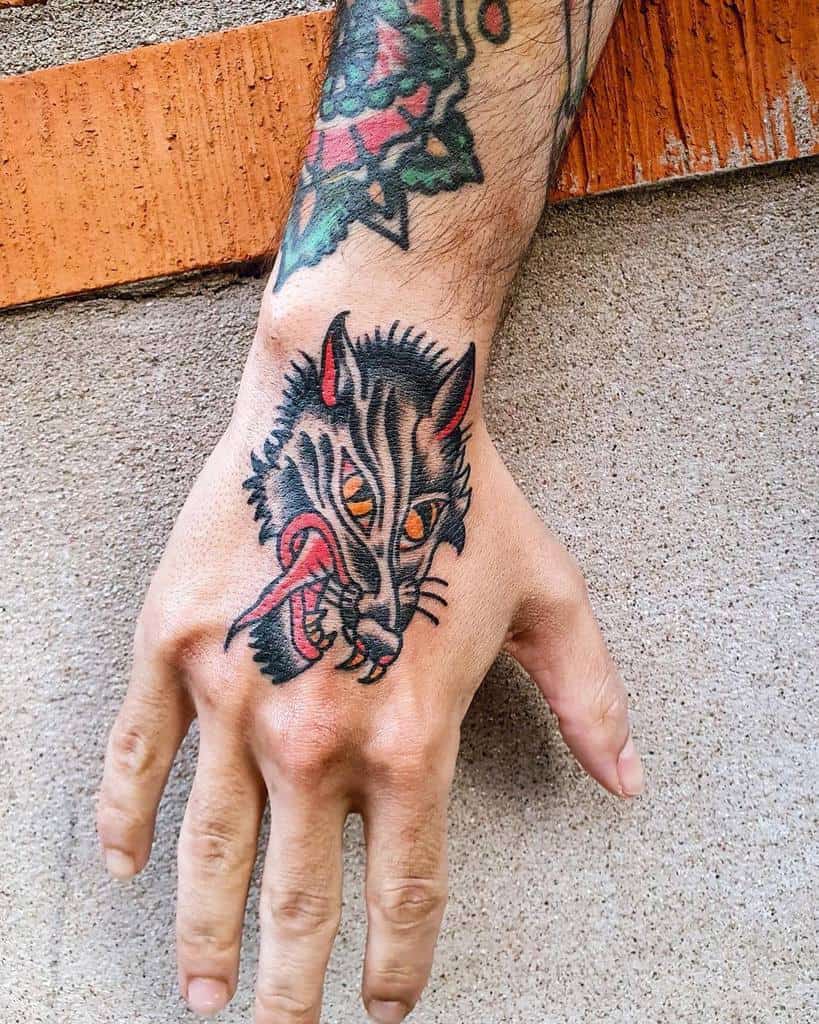Traditional Wolf Hand Tattoo david.m.wedelin