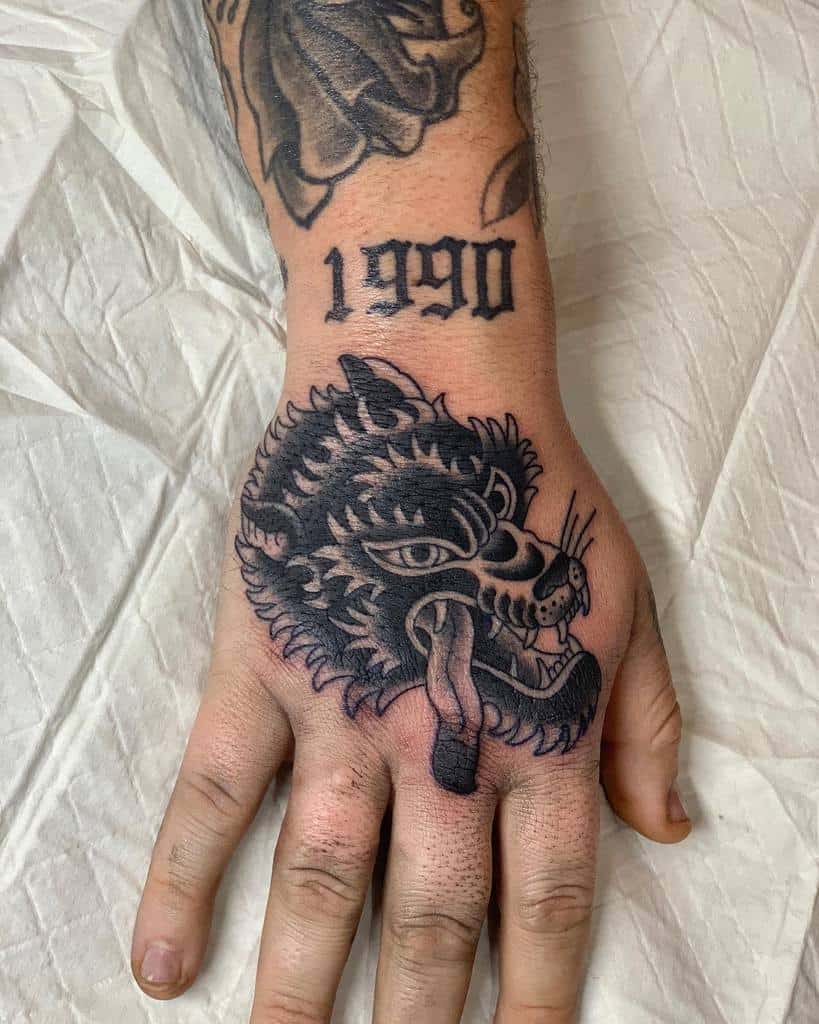 Traditional Wolf Hand Tattoo deepakmunsami