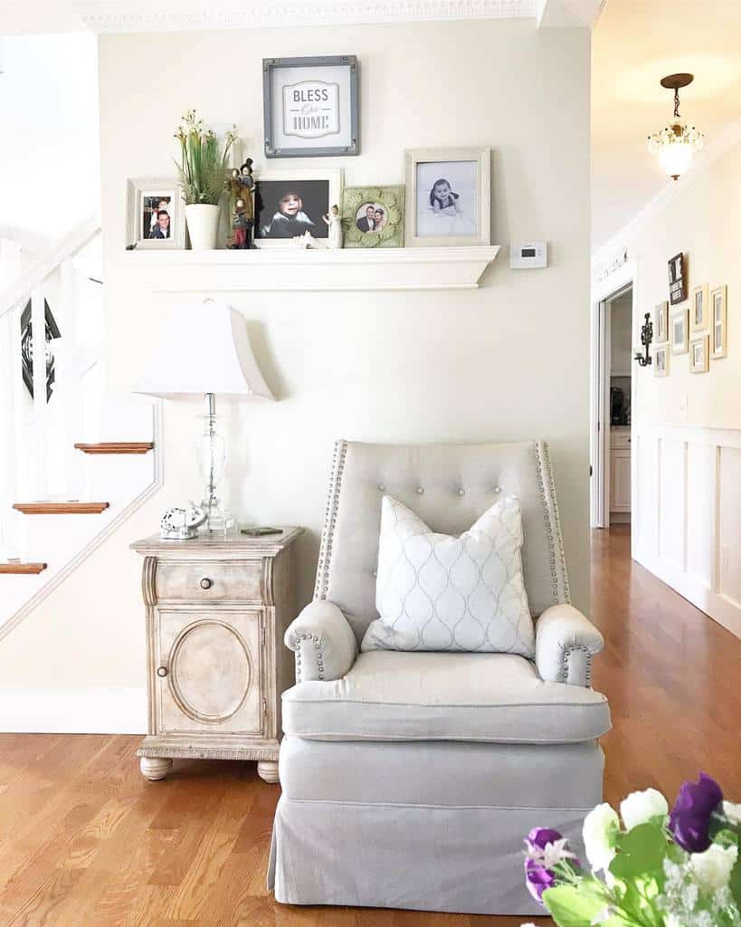 small foyer home with gray accent chair