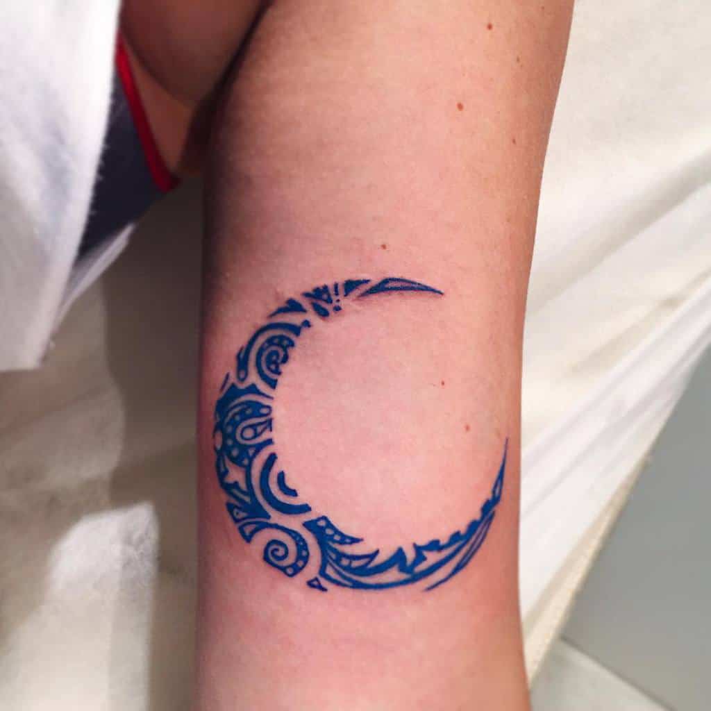 tribal half moon tattoo