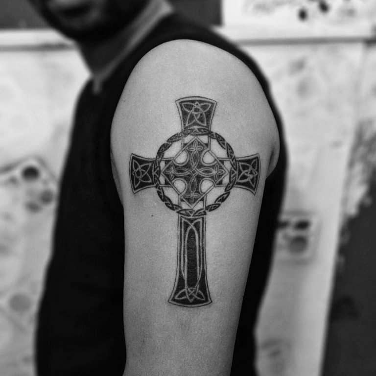 67 Cool Tribal Cross Tattoo Ideas   Tribal Cross Upperarm Tattoo Inkstattoopune 768x768 