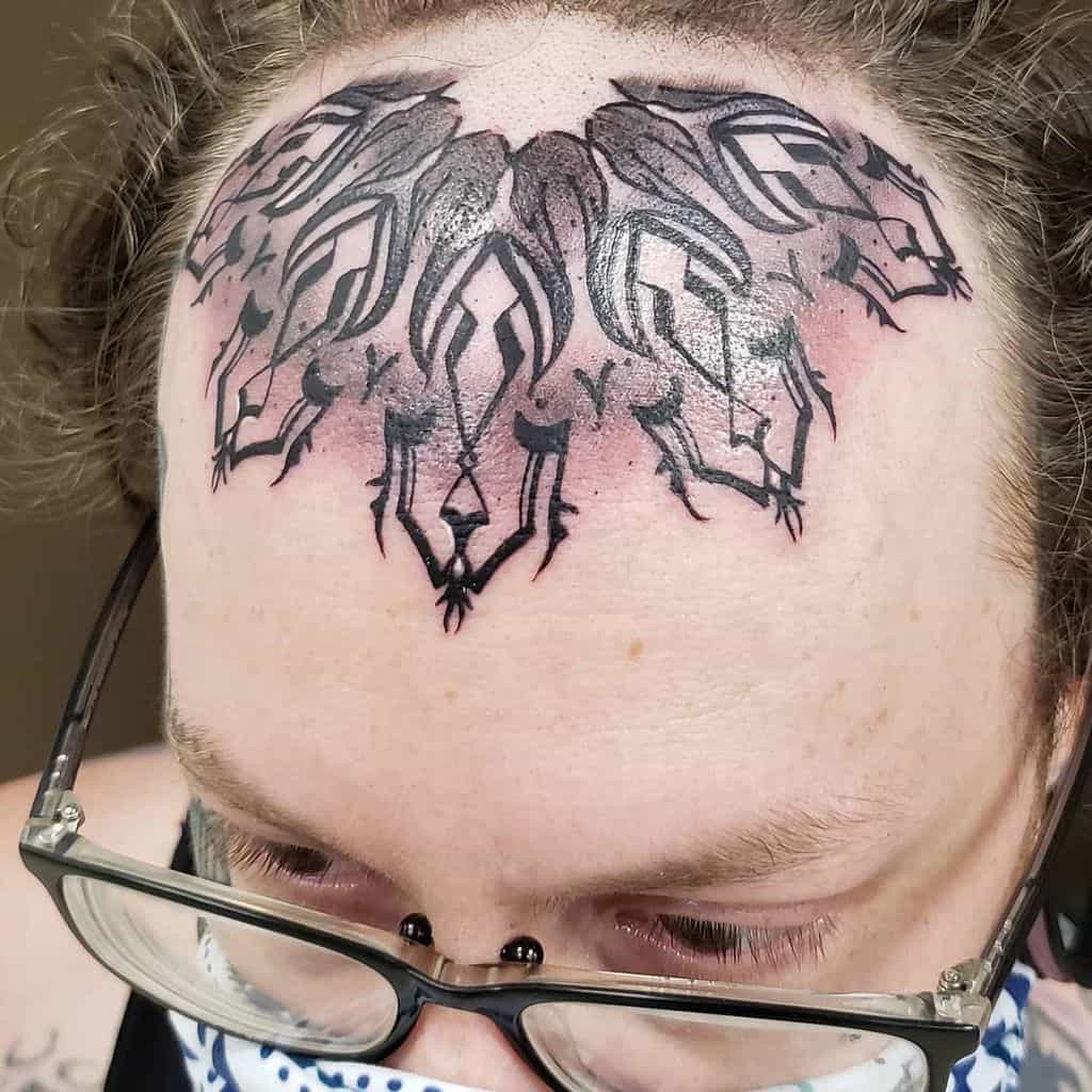 Tribal Face Forehead Tattoo goldleaftattoocollective