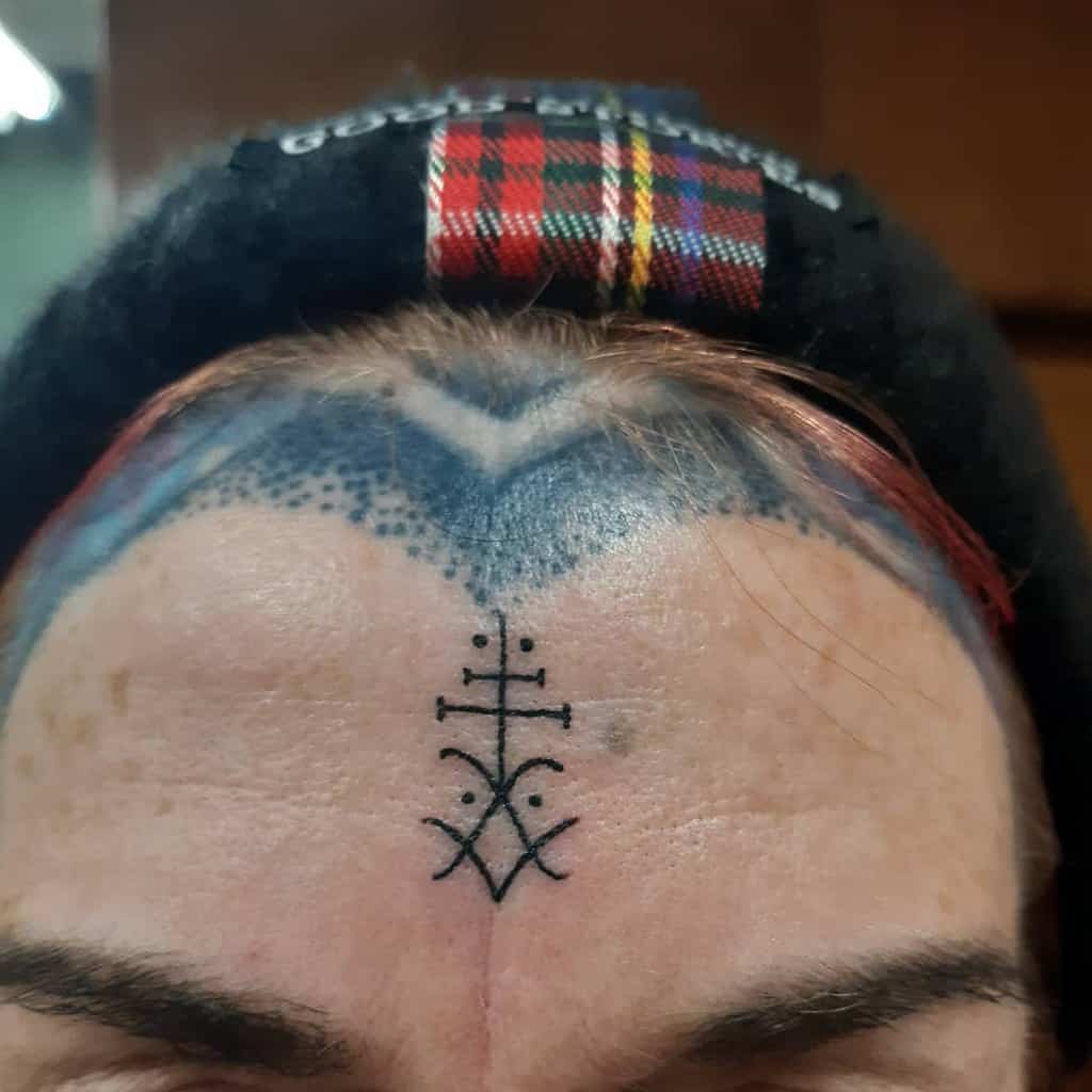 Tribal Face Forehead Tattoo maefloradavies