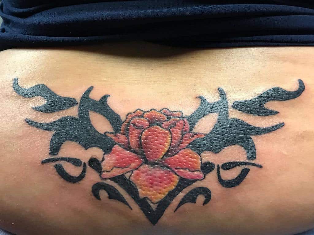 Tribal Flower Back Tattoo kloos_tattoos