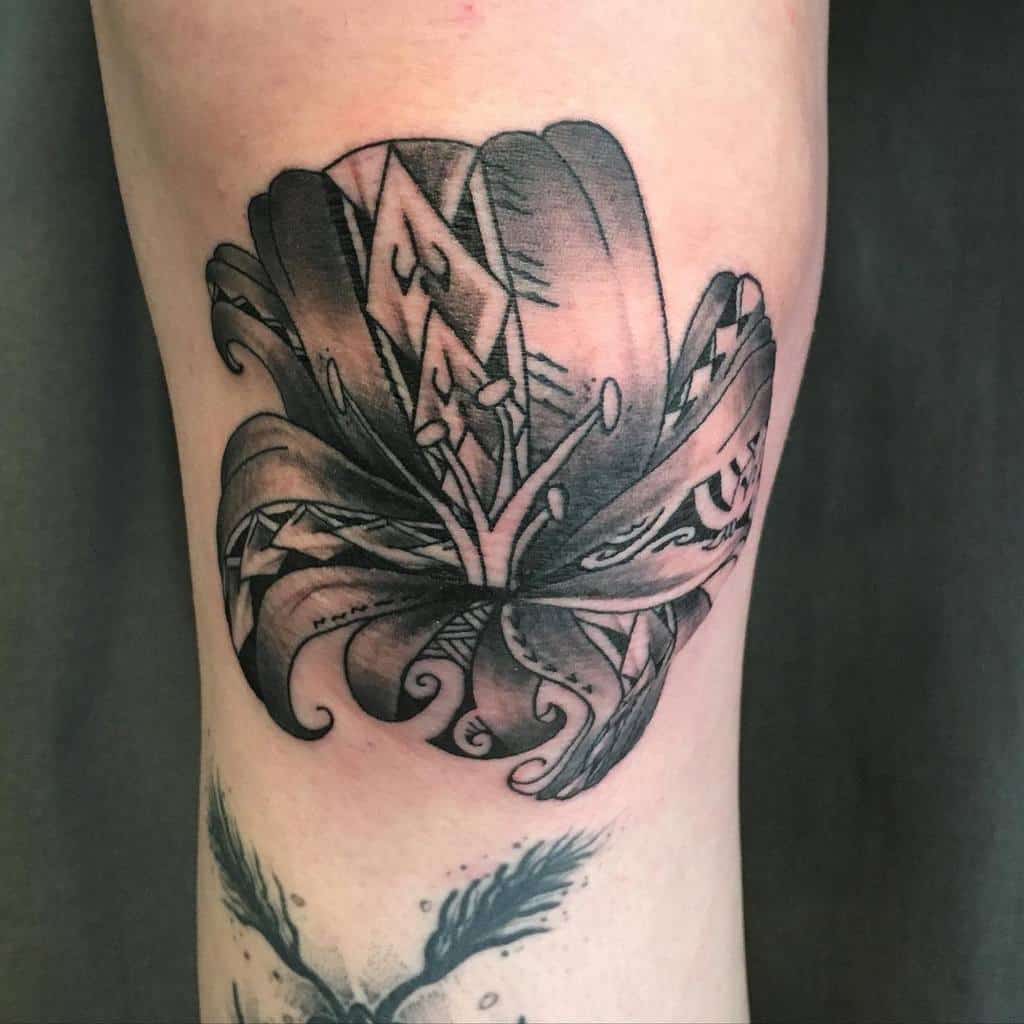 Tribal Flower Leg Tattoo jerome_titeca_tattoo