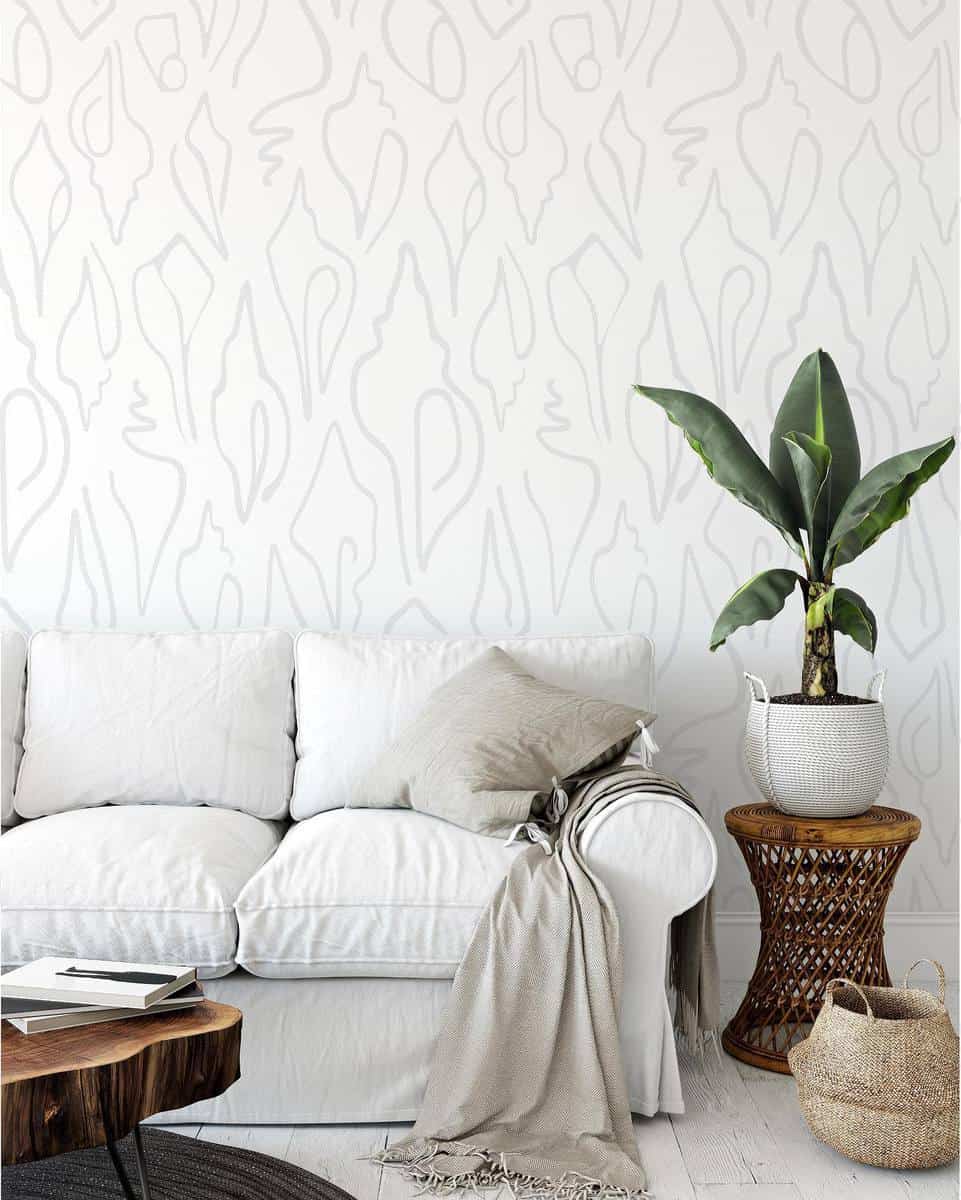 white pattern wallpaper with sofa 