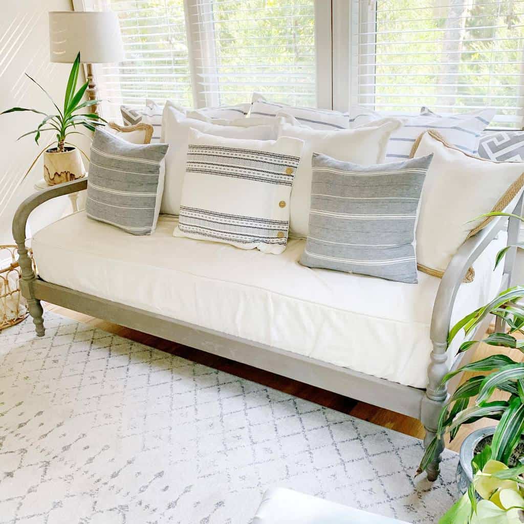 gray chair in sunroom 