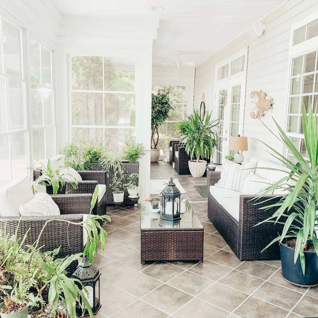 large sunroom with wicker furniture 