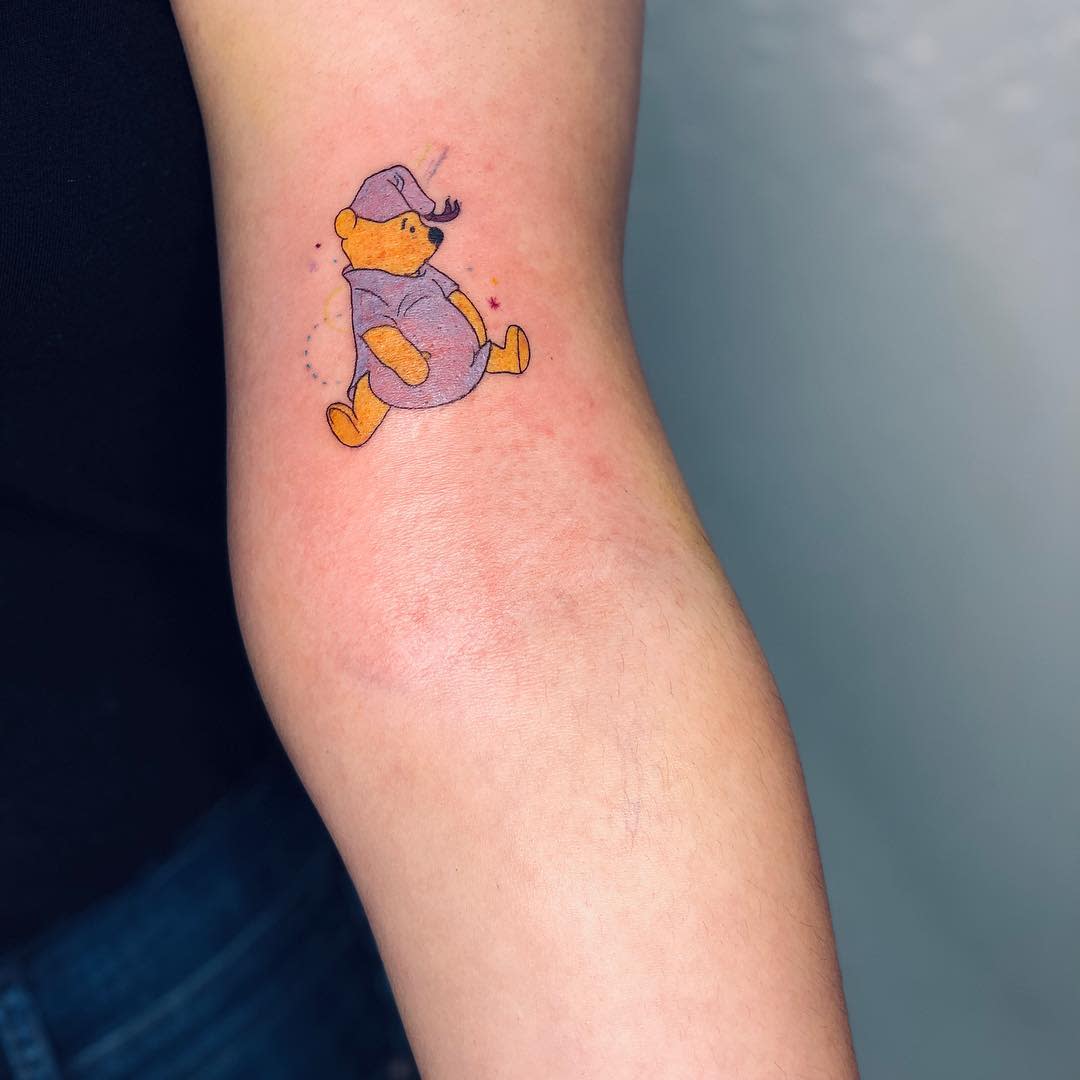 Tatuaje pequeño de Winnie the Pooh -lmoolah_tattoo