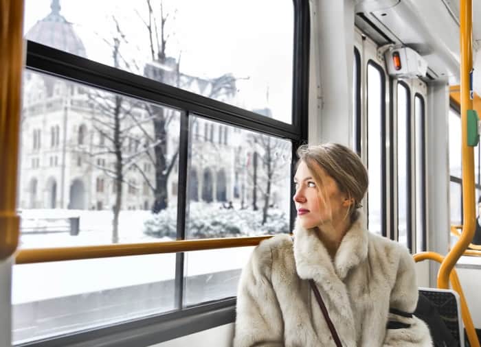 Woman Looking Out Of Train Window