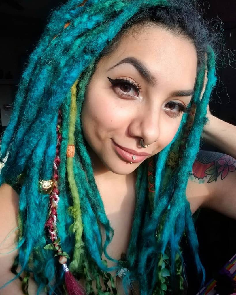 Woman With Dreadlocks Shaded In Bold Colors