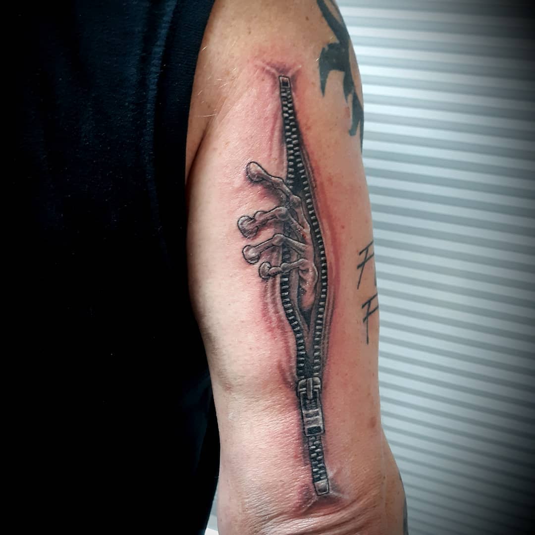 Arm Zipper Tattoo -tattoos_by_rhino