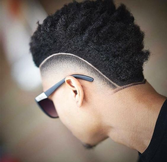 A frohawk look paired with an undercut for contrast and definition