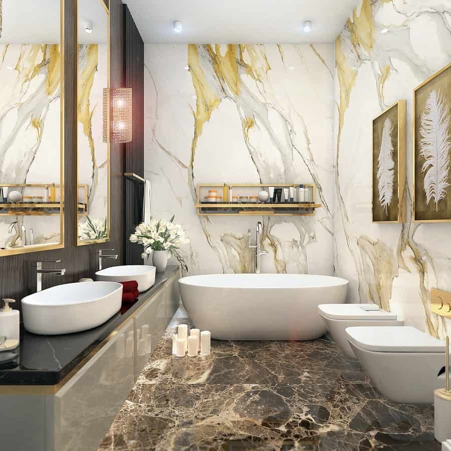 luxury marble bathroom freestanding tub floating toilets dual vanities feather artwork gold rimmed mirrors 