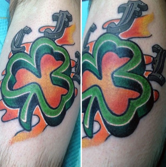 Abstract 3d Shamrock Mens Forearm Tattoo With Green And Orange Ink