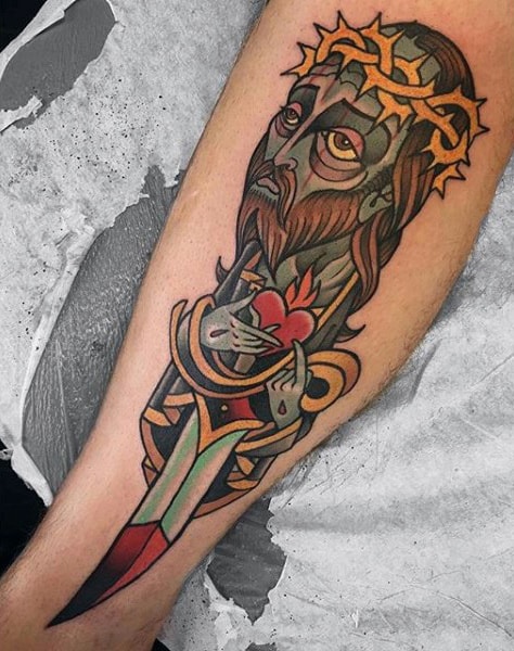 Abstract Artistic Tattoos Of Jesus Christ With Dagger On Mans Leg