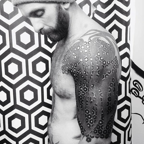 Abstract Tribal With Geometric Shapes Background Blackwork Tattoo For Men On Upper Arm