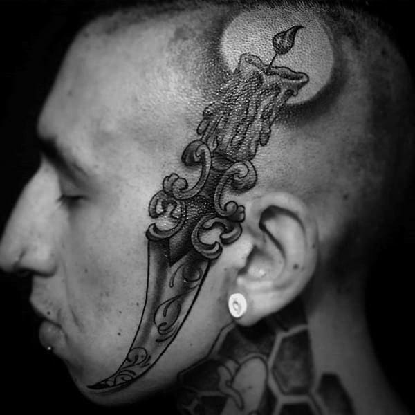 Amazing Candle Dagger Mens Face Tattoo Designs