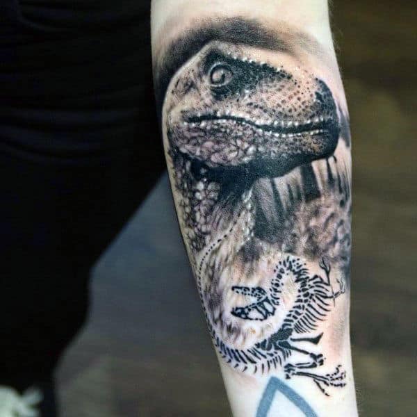 Amazing Dinosaur Tattoo With Tiny Skeletal Bones Tattoo Male Forearm