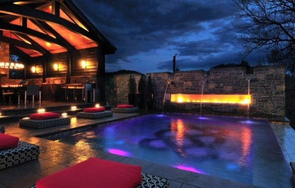 Amazing Home Swimming Pool With Huge Outdoor Fireplace And Neon Lights