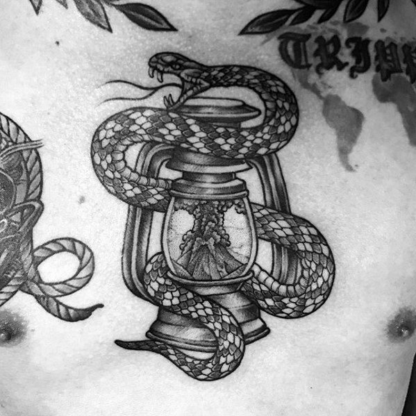 Amazing Mens Volcano With Snake And Lantern Chest Tattoo Designs