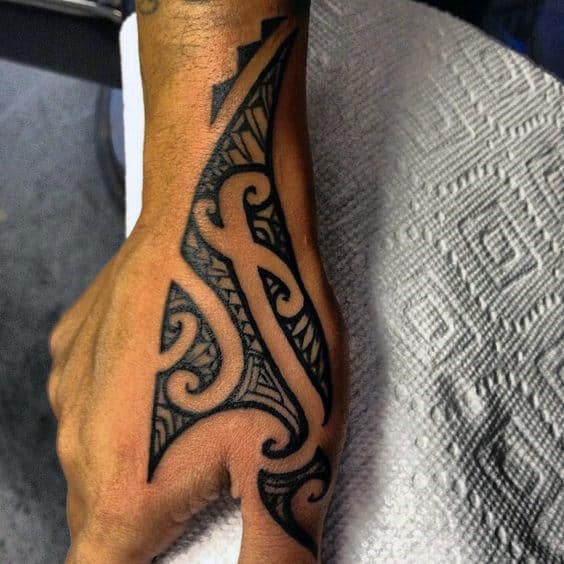 Amazing Tribal Hand Tattoo On Man