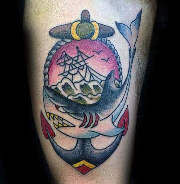 anchor-with-shark-traditional-tattoo-on-mans-thigh