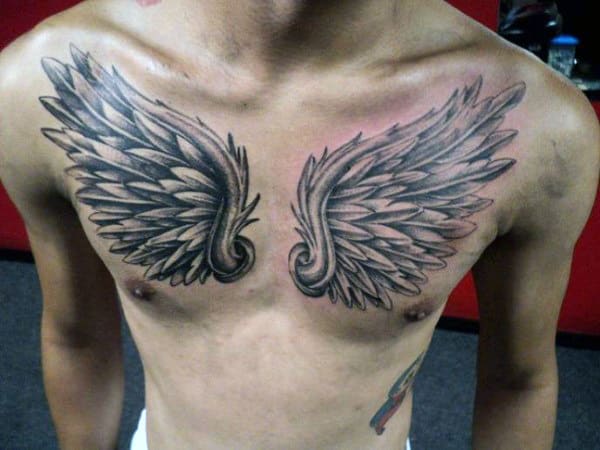 Top 115+ angel vs demon tattoo chest