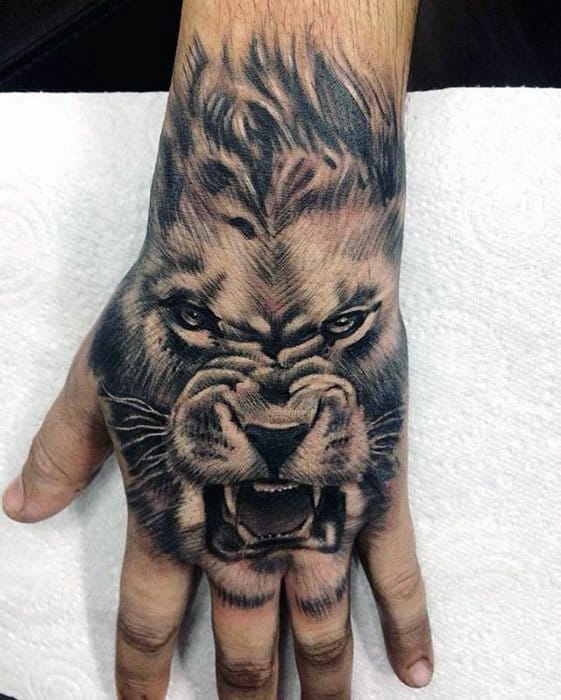 Angry Lion Mens Hand Tattoo Designs
