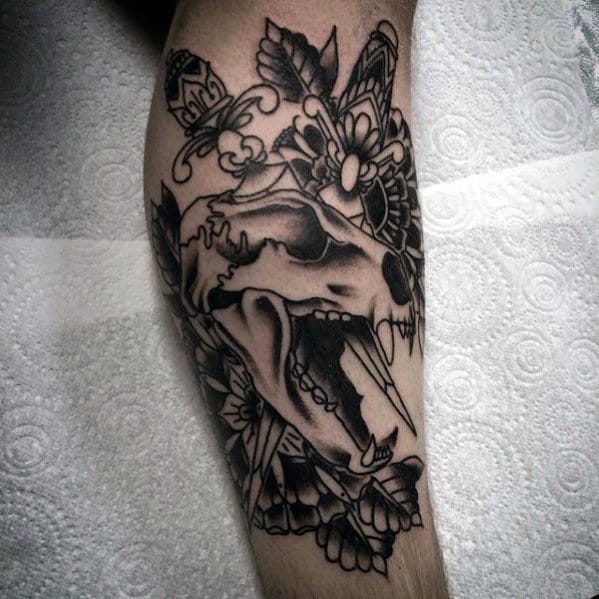 Animal Skull With Dagger Traditional Leg Shaded Mens Tattoos