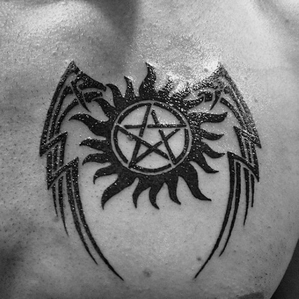 Anti Possession Symbol With Wings Mens Chest Tattoo
