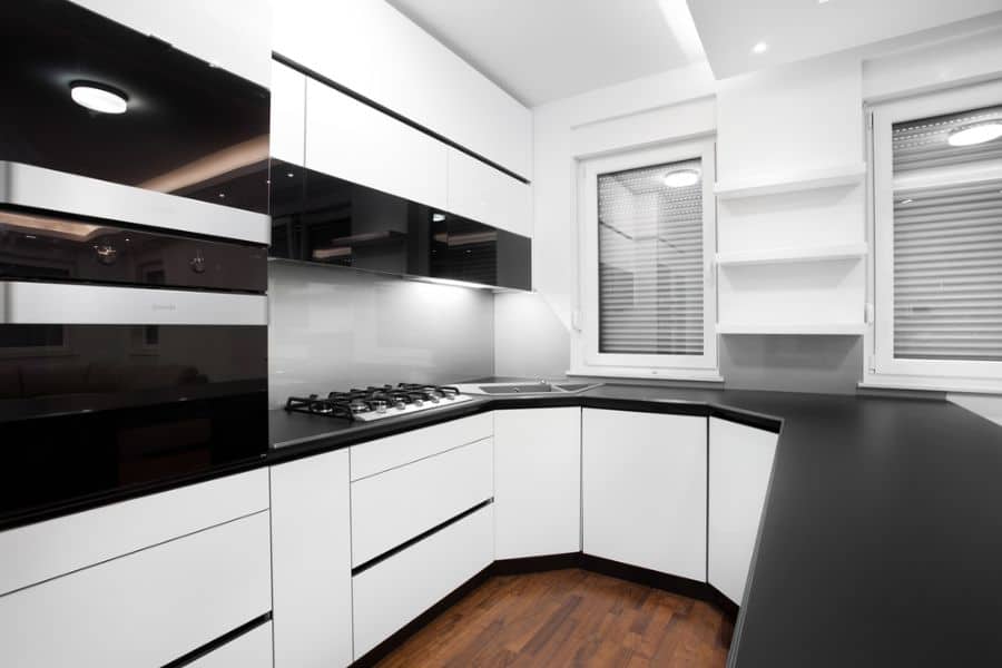 small corner black and white kitchen 