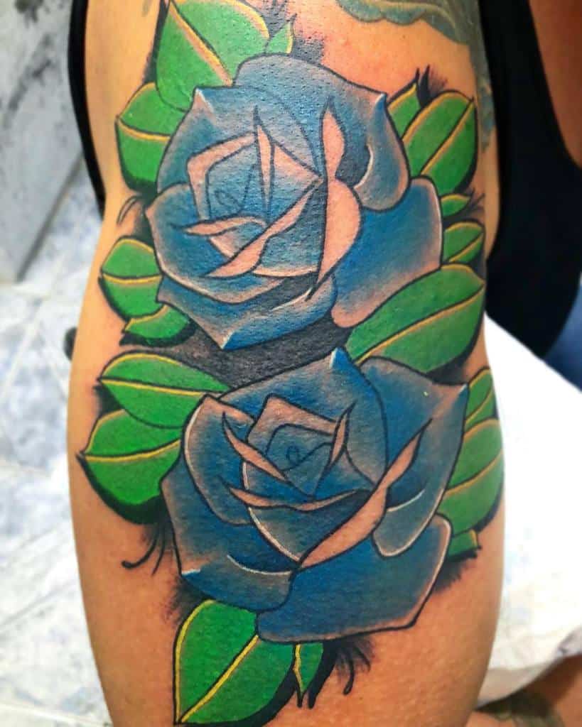 Blue rose tattoo on Marks right hand done in Tahoe at