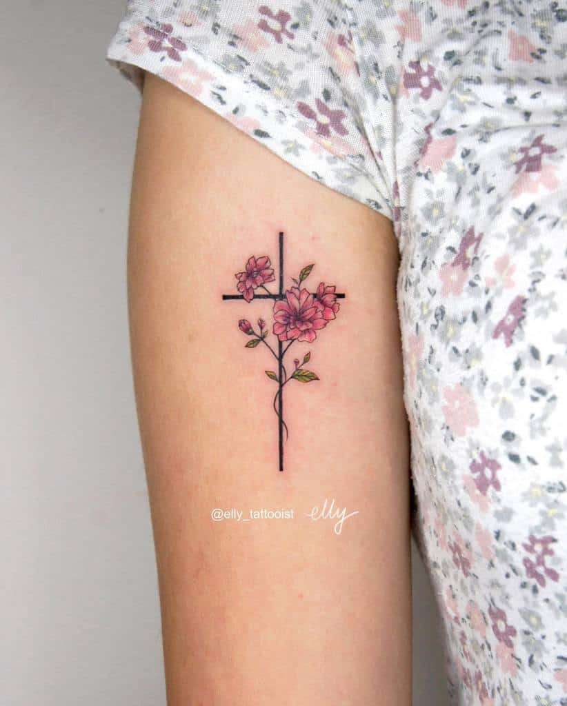 arm cross tattoos for women elly_tattooist