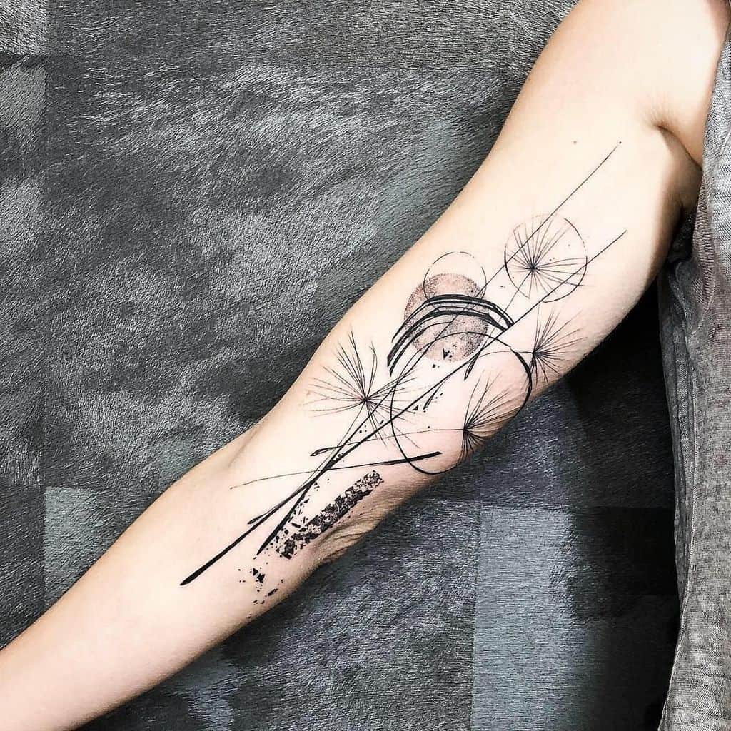arm fine line dandelion tattoo
