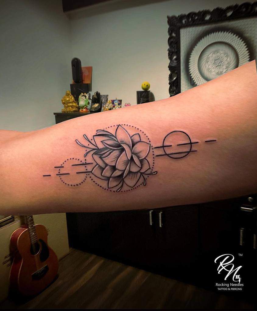 arm geometric flower tattoo rockingneedles