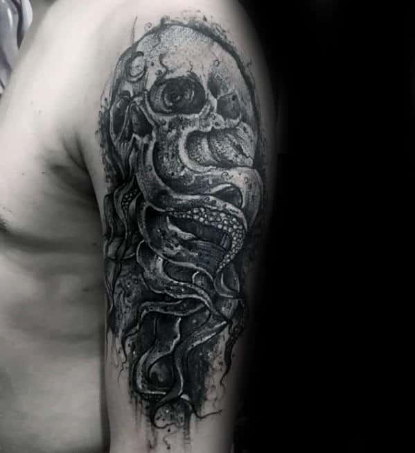 Arm Tattoo Of Octopus And Skull On Man