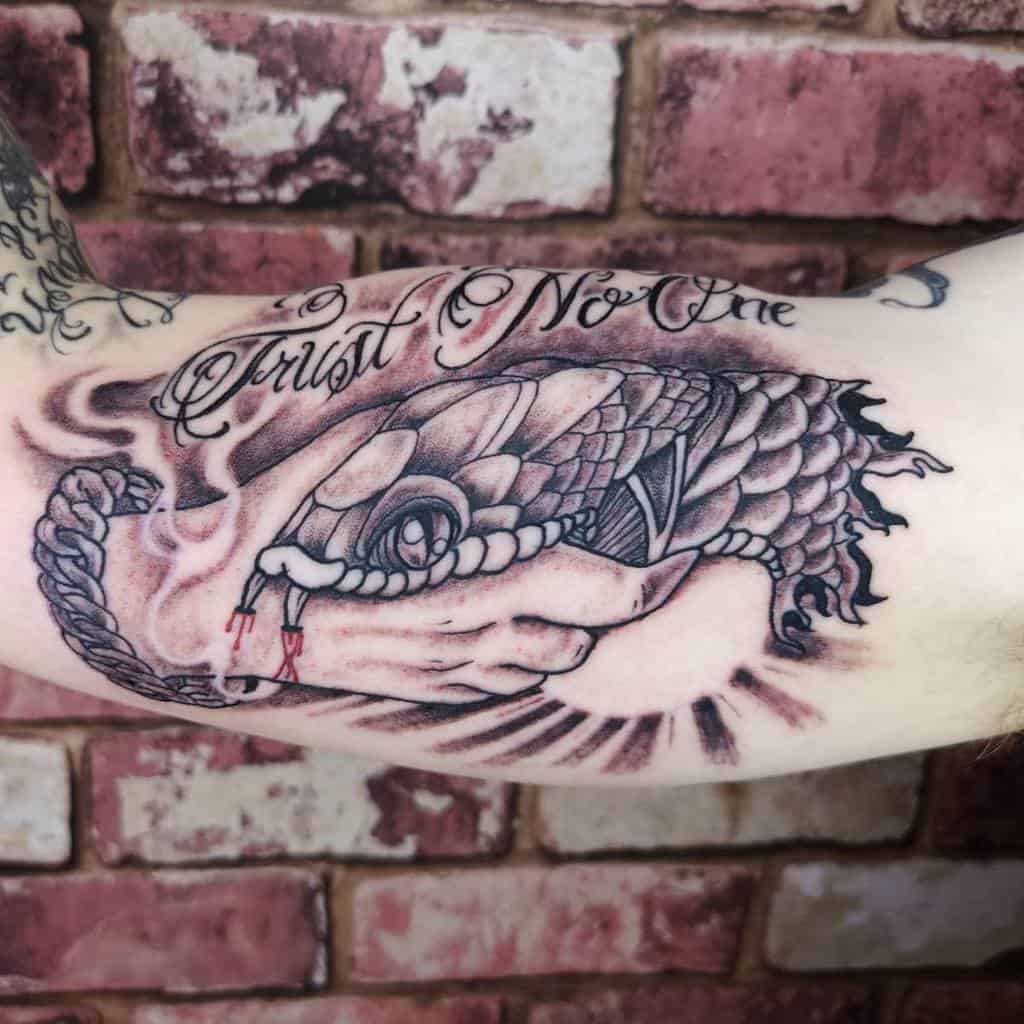 arm trust no one tattoos dark_ritual_tattoo