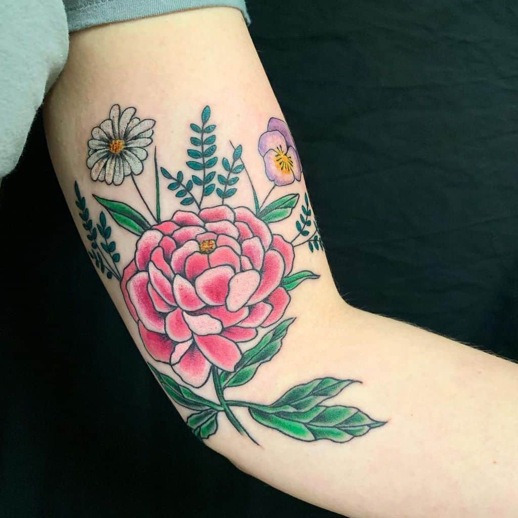 arm wildflower tattooschampiontattoocompany